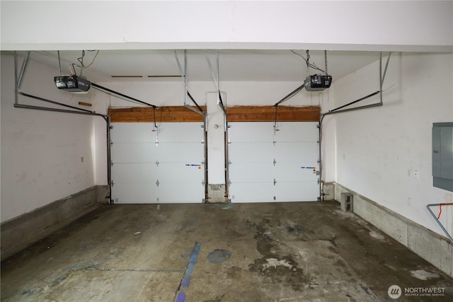 1488 Ocean Shores Blvd SW, Ocean Shores, WA 98569 - garage featuring a garage door opener and electric panel