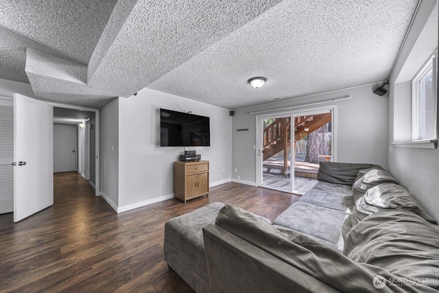 4402 Clearwater Dr SE, Lacey, WA 98503 - living area with dark wood-style flooring and a textured ceiling