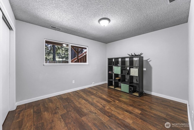 4402 Clearwater Dr SE, Lacey, WA 98503 - unfurnished office with wood finished floors and a textured ceiling