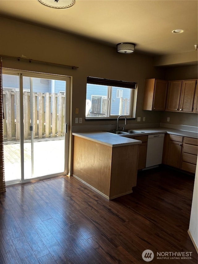 6304 Barstow Ln SE Unit 7, Lacey, WA 98513 - kitchen with white dishwasher, a peninsula, dark wood finished floors, light countertops, and recessed lighting