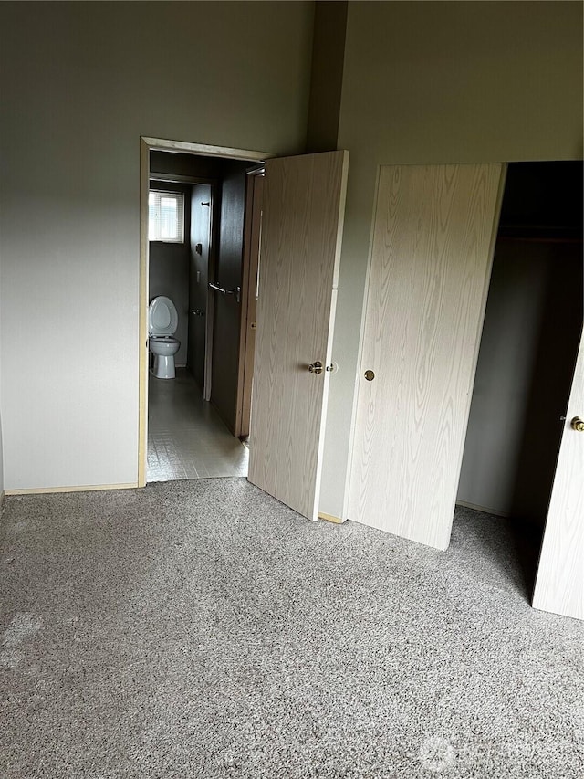 6304 Barstow Ln SE Unit 7, Lacey, WA 98513 - unfurnished bedroom featuring carpet floors, a closet, and ensuite bathroom