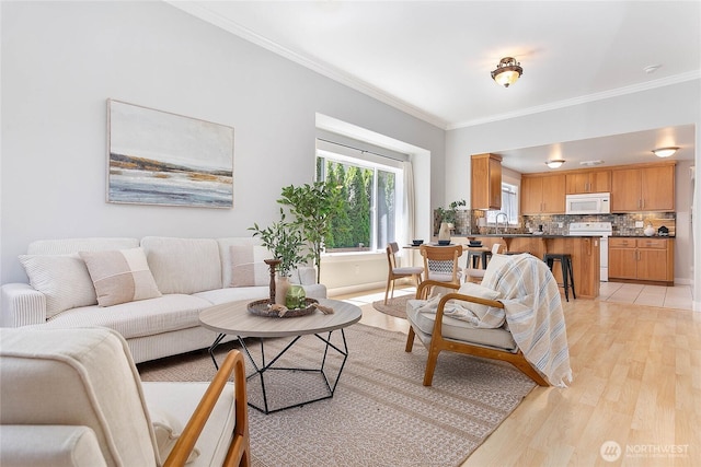 2427 Lincoln St, Bellingham, WA 98225 - living area featuring light wood finished floors and crown molding