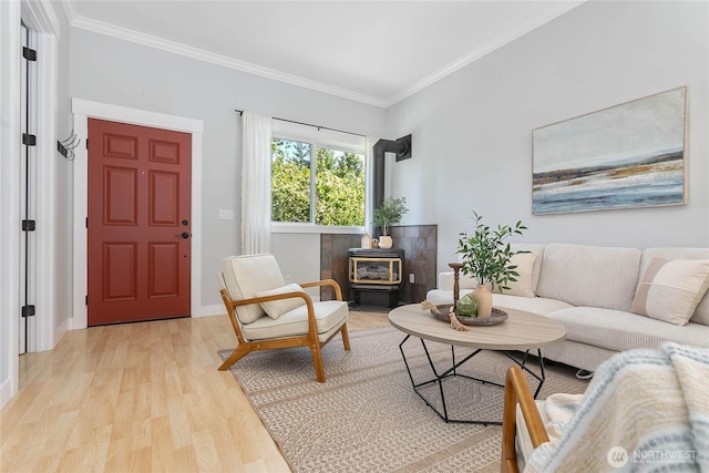 2427 Lincoln St, Bellingham, WA 98225 - living area with a wood stove, light wood-type flooring, and crown molding