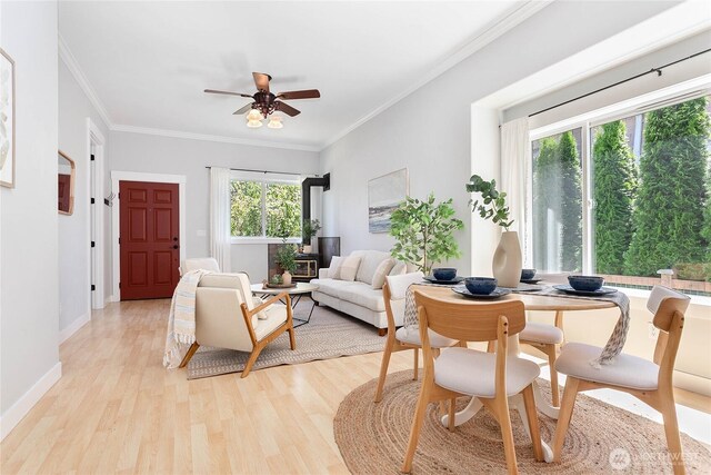 2427 Lincoln St, Bellingham, WA 98225 - living area with light wood-style flooring, crown molding, and ceiling fan