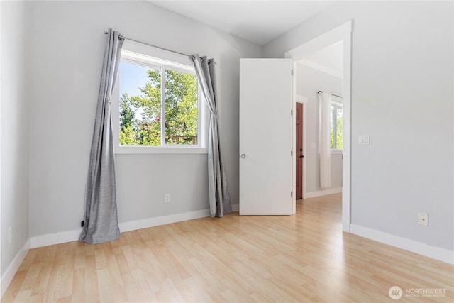 2427 Lincoln St, Bellingham, WA 98225 - empty room featuring plenty of natural light and wood finished floors