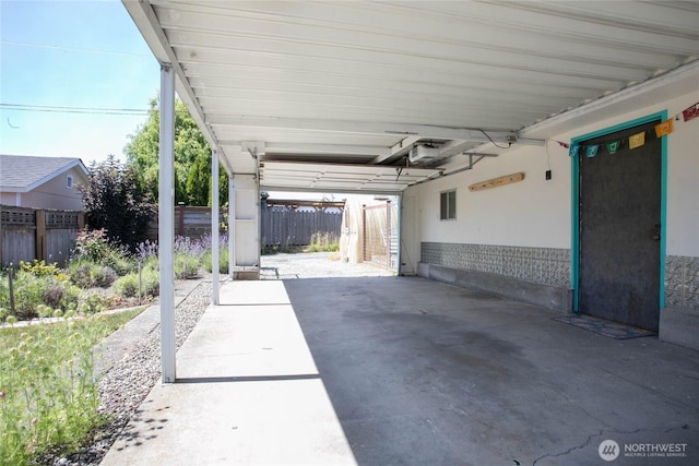 2427 Lincoln St, Bellingham, WA 98225 - garage featuring a carport and a garage door opener