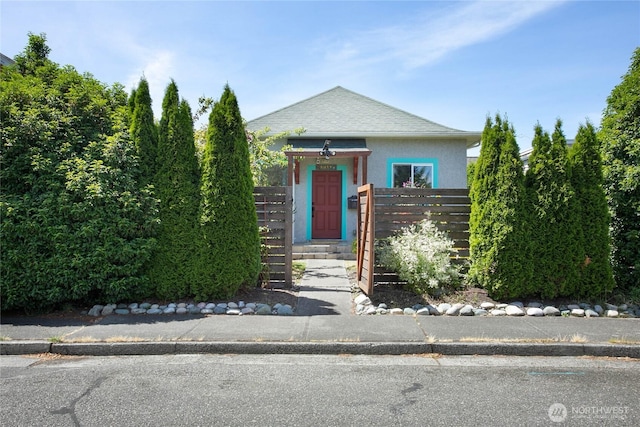 2427 Lincoln St, Bellingham, WA 98225 - view of front of property with stucco siding and roof with shingles