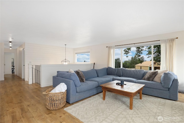 11112 234th St E, Graham, WA 98338 - living area featuring light wood-style flooring and healthy amount of natural light