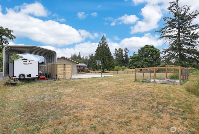 11112 234th St E, Graham, WA 98338 - view of grassy yard featuring a carport