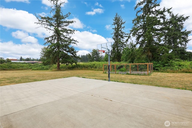 11112 234th St E, Graham, WA 98338 - view of sport court with basketball hoop and a lawn