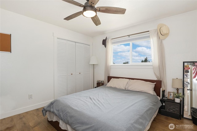 11112 234th St E, Graham, WA 98338 - bedroom featuring a closet, wood finished floors, and ceiling fan