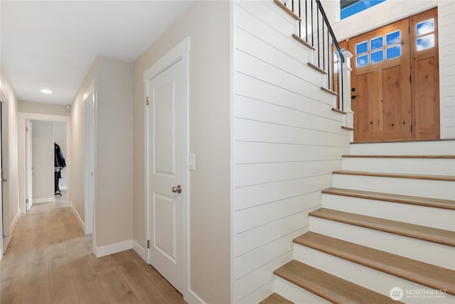 11112 234th St E, Graham, WA 98338 - staircase featuring recessed lighting and hardwood / wood-style flooring
