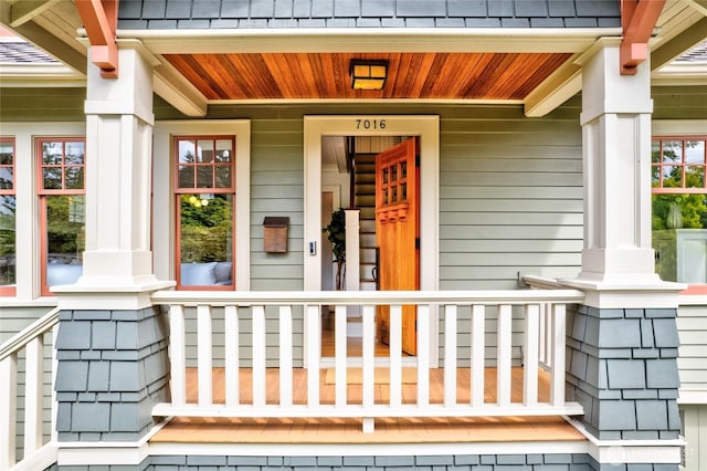 7016 Fremont Ave N, Seattle, WA 98103 - entrance to property featuring covered porch and roof with shingles