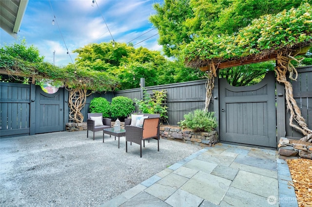 7016 Fremont Ave N, Seattle, WA 98103 - fenced backyard featuring a gate and a patio