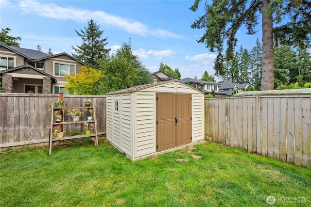204 Duvall Ave SE, Renton, WA 98059 - view of shed featuring a fenced backyard and a residential view