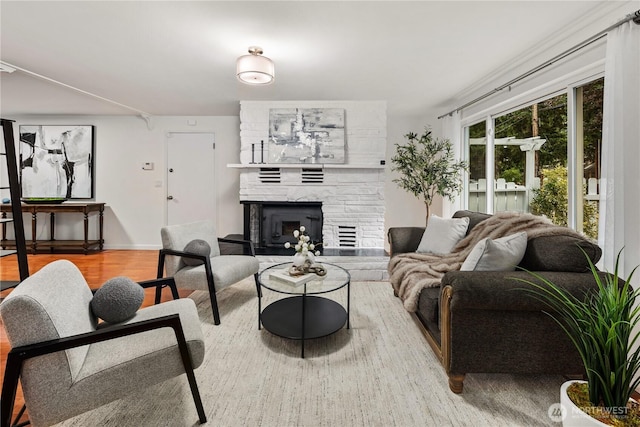 204 Duvall Ave SE, Renton, WA 98059 - living room with wood finished floors and a fireplace