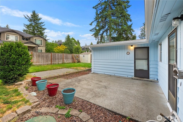 204 Duvall Ave SE, Renton, WA 98059 - fenced backyard with a patio and a shed