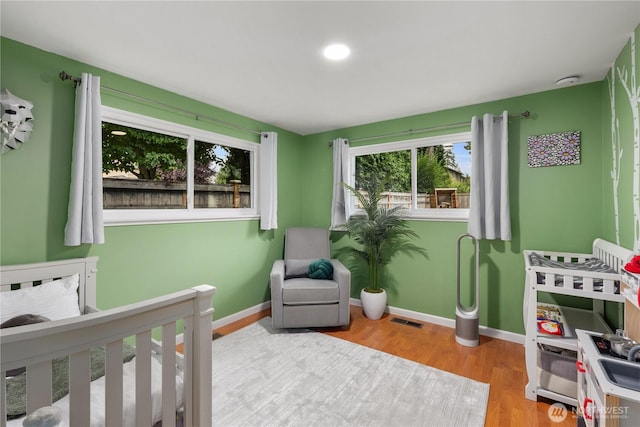 204 Duvall Ave SE, Renton, WA 98059 - bedroom featuring wood finished floors and baseboards