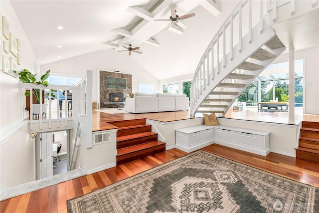 18110 85th St E, Bonney Lake, WA 98391 - stairs with a ceiling fan, wood finished floors, beamed ceiling, healthy amount of natural light, and high vaulted ceiling