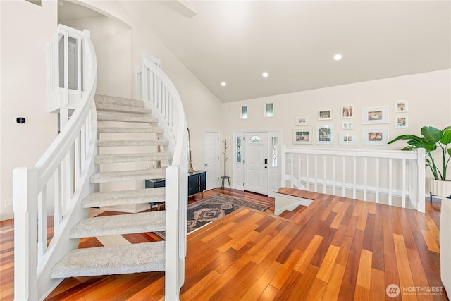 18110 85th St E, Bonney Lake, WA 98391 - entrance foyer featuring wood finished floors, stairway, recessed lighting, and high vaulted ceiling