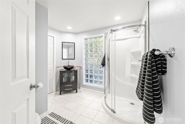 18110 85th St E, Bonney Lake, WA 98391 - bathroom with a shower stall, vanity, and recessed lighting