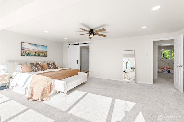 18110 85th St E, Bonney Lake, WA 98391 - bedroom with light colored carpet, a barn door, recessed lighting, and ceiling fan