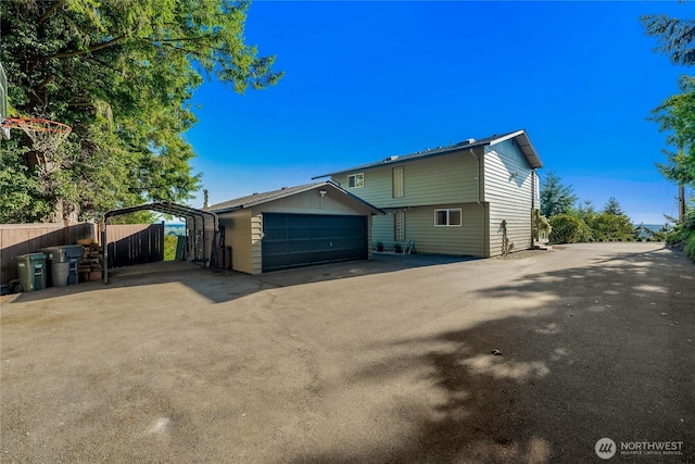 18110 85th St E, Bonney Lake, WA 98391 - view of side of property featuring a carport and an outdoor structure
