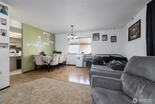 1710 E Highland Ave, Mount Vernon, WA 98273 - living room featuring a chandelier and wood finished floors