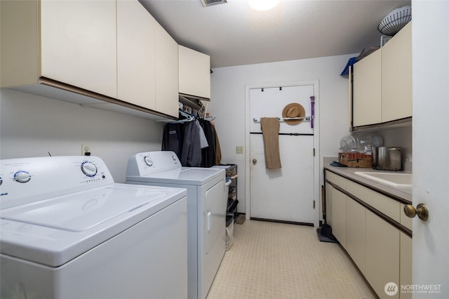 1710 E Highland Ave, Mount Vernon, WA 98273 - laundry room with cabinet space and washing machine and clothes dryer