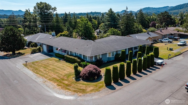 1710 E Highland Ave, Mount Vernon, WA 98273 - aerial view of property and surrounding area with a mountainous background