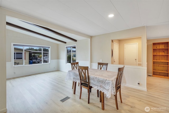 1402 22nd St NE Unit 86, Auburn, WA 98002 - dining room with light wood-style floors and a wainscoted wall