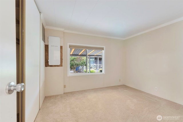 1402 22nd St NE Unit 86, Auburn, WA 98002 - carpeted spare room with ornamental molding