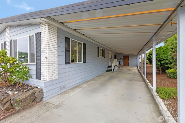 1402 22nd St NE Unit 86, Auburn, WA 98002 - view of patio with a carport