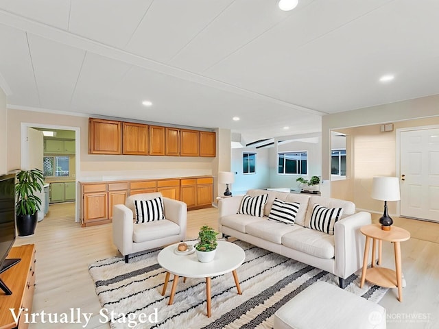 1402 22nd St NE Unit 86, Auburn, WA 98002 - living room featuring light wood-type flooring, recessed lighting, plenty of natural light, and ornamental molding