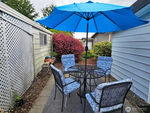 1402 22nd St NE Unit 86, Auburn, WA 98002 - view of patio / terrace with outdoor dining space