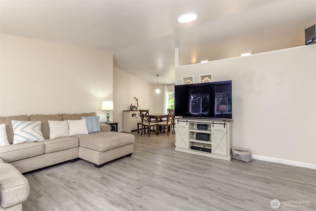 15816 251st St E, Graham, WA 98338 - living area with wood finished floors and vaulted ceiling