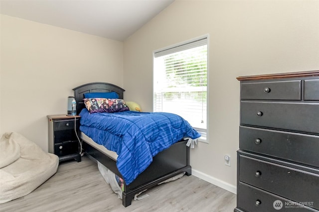 15816 251st St E, Graham, WA 98338 - bedroom featuring light wood-type flooring and lofted ceiling
