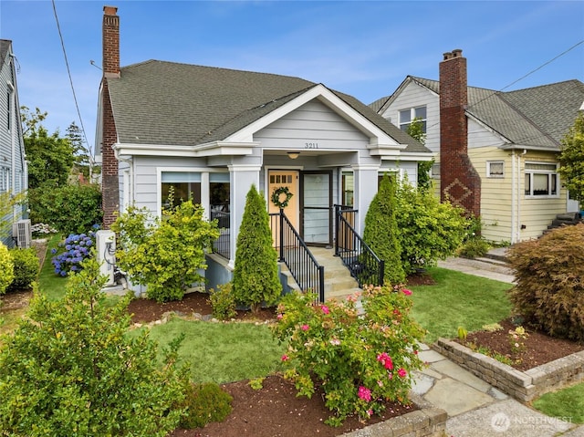 3211 16th Ave S, Seattle, WA 98144 - bungalow-style house featuring a chimney and a shingled roof