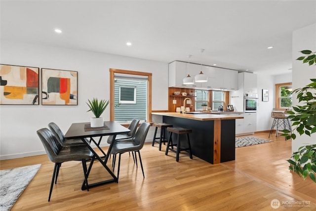 3211 16th Ave S, Seattle, WA 98144 - dining space with light wood finished floors and recessed lighting