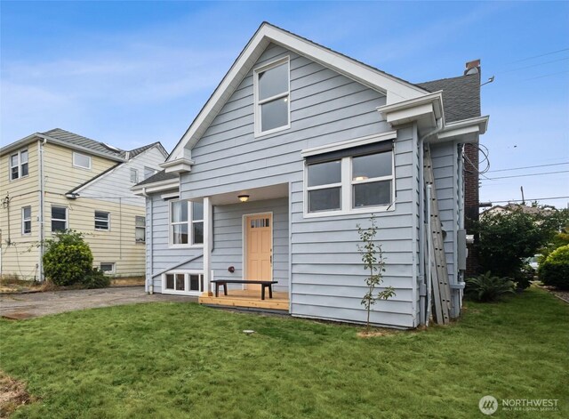 3211 16th Ave S, Seattle, WA 98144 - back of house featuring a yard