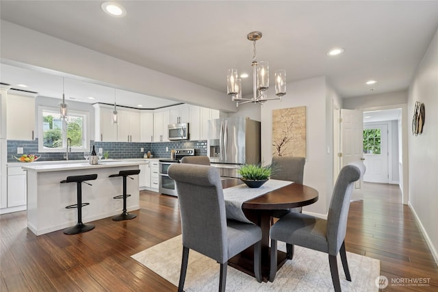 111 27th Ave S, Seattle, WA 98144 - dining area featuring a chandelier, dark wood-style floors, and recessed lighting