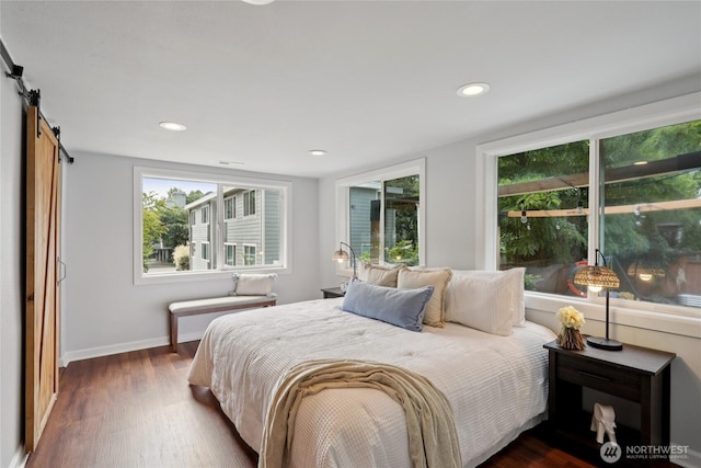111 27th Ave S, Seattle, WA 98144 - bedroom with dark wood-style flooring, a barn door, and recessed lighting