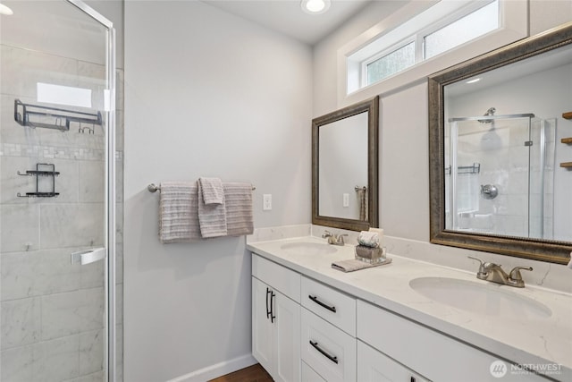 111 27th Ave S, Seattle, WA 98144 - bathroom with double vanity, a shower stall, and recessed lighting