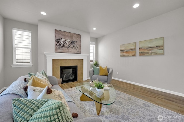 11103 5th Ave SW, Seattle, WA 98146 - living area with a fireplace, wood finished floors, and recessed lighting