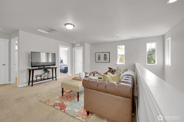 11103 5th Ave SW, Seattle, WA 98146 - carpeted living area with baseboards and attic access