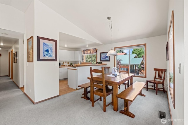 106 River St, Leavenworth, WA 98826 - dining room featuring light colored carpet and lofted ceiling