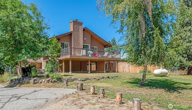 106 River St, Leavenworth, WA 98826 - rear view of house featuring a deck and a chimney