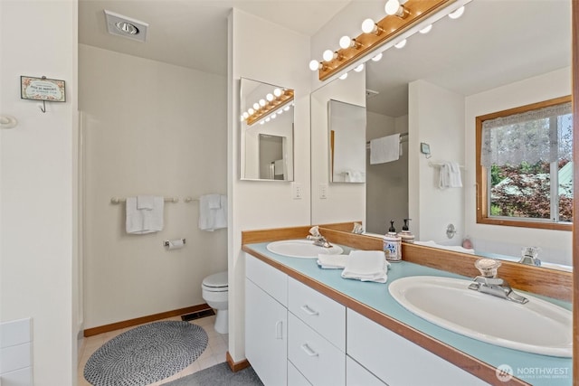 106 River St, Leavenworth, WA 98826 - bathroom featuring double vanity and tile patterned flooring