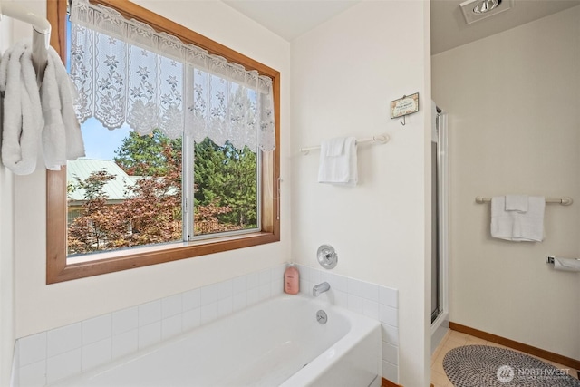 106 River St, Leavenworth, WA 98826 - full bath featuring a bath, a shower stall, and tile patterned floors