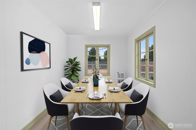 2104 Stuart St, Raymond, WA 98577 - dining space with wood finished floors and ornamental molding